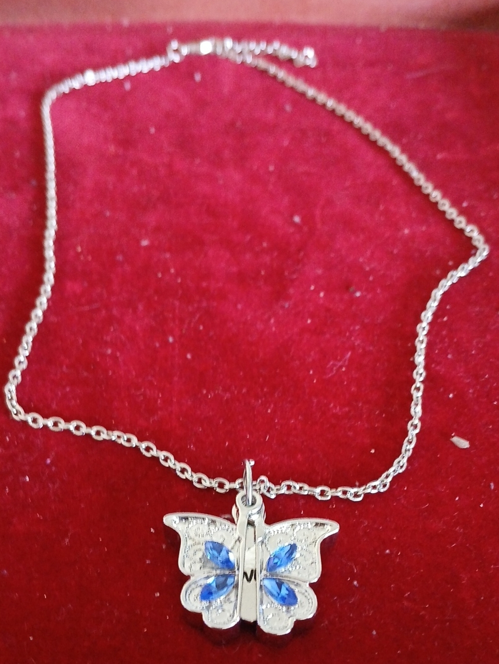 Sterling Silver Butterfly Pendant Necklace with Blue Accents